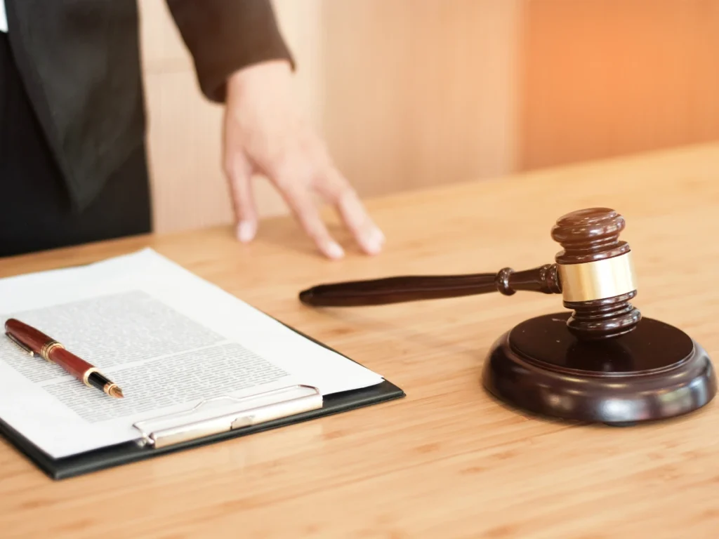 A judge's gavel resting on a bench symbolizing the legal consequences of DUI offenses and the role of court-mandated DUI education classes or treatment programs in the recovery process.
